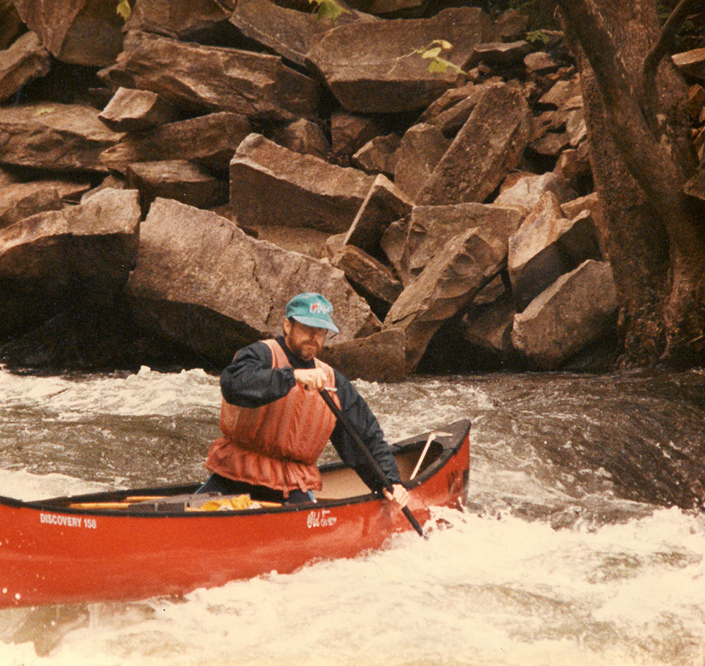 Bob Sehlinger in a red canoe.
